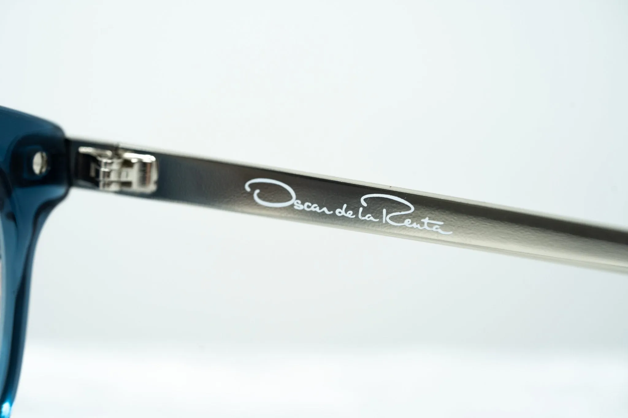 Oscar De La Renta Eyeglasses  Oval Blue and Clear
